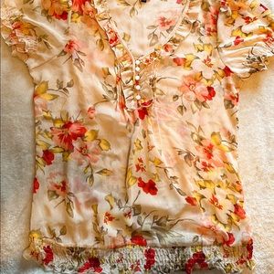 Reitmans Semi-sheer floral short-sleeved blouse, size Medium.